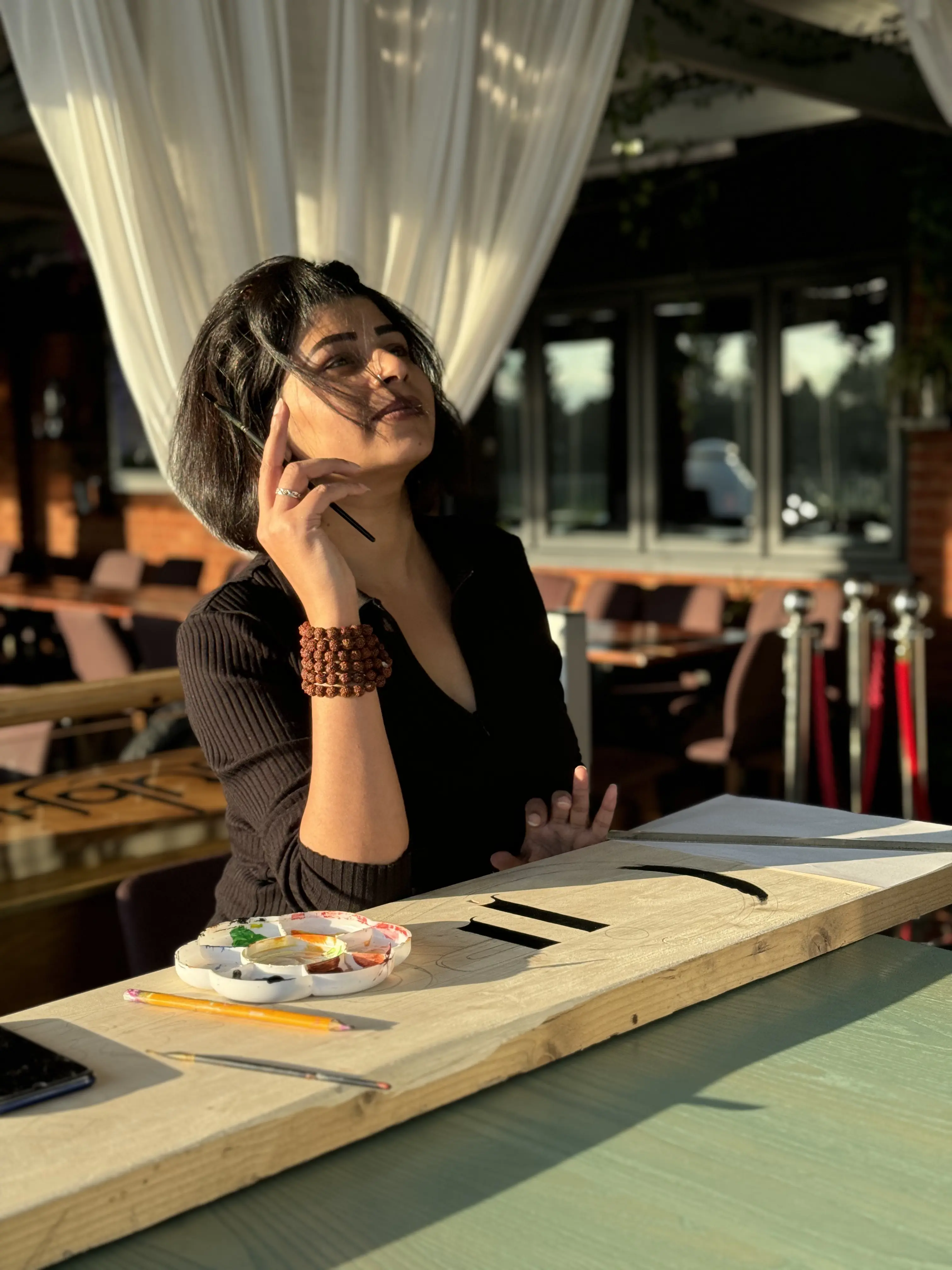 Artist Sneha Solkhe working on a piece